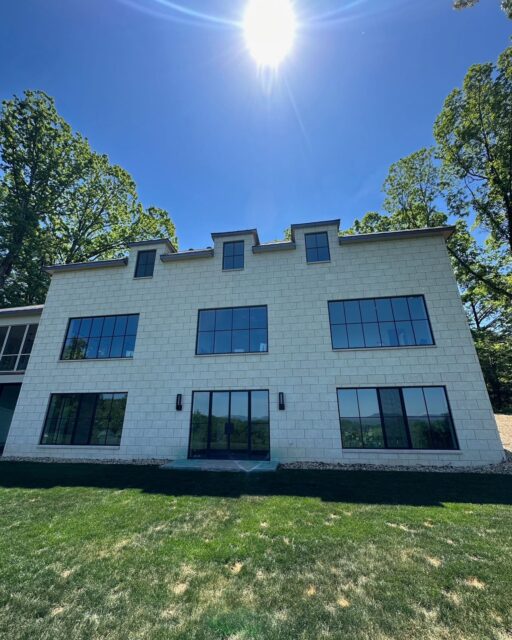 Where craftsmanship meets elegance: custom windows framing a masterpiece, surrounded by timeless limestone and a stunning copper roof. #CustomDesign #ArchitecturalBeauty #Limestone #CopperRoof #WindowGoals #BuildingWithStyle #Customwindows #Steelwindows #Hopeswindows #Agnoraglass #Customdoors #CustomFrontEntry