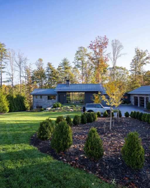 Where precision meets nature 🔨 This modern retreat features German wood aluminum-clad windows and a full curtain wall, flooding the home with light while staying rooted in the landscape. #Curtainwall #customdesign #unilux #customstone #landscaping #customarchitecture #wncmountains 

Featuring stunning shots from drewpedenmedia ✨and highcountrylandscapes beautiful landscape design that compliments this house beautifully 🔥